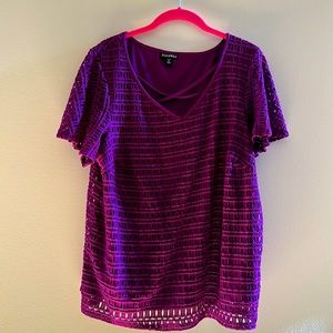Size 1X open weave top with material underneath.